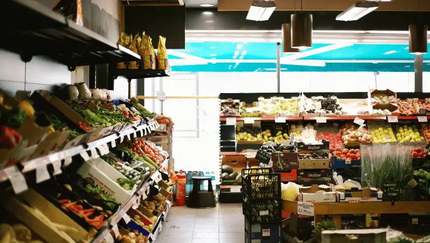 Grocery store selling fresh vegetables and local produce for sale in Lausanne
